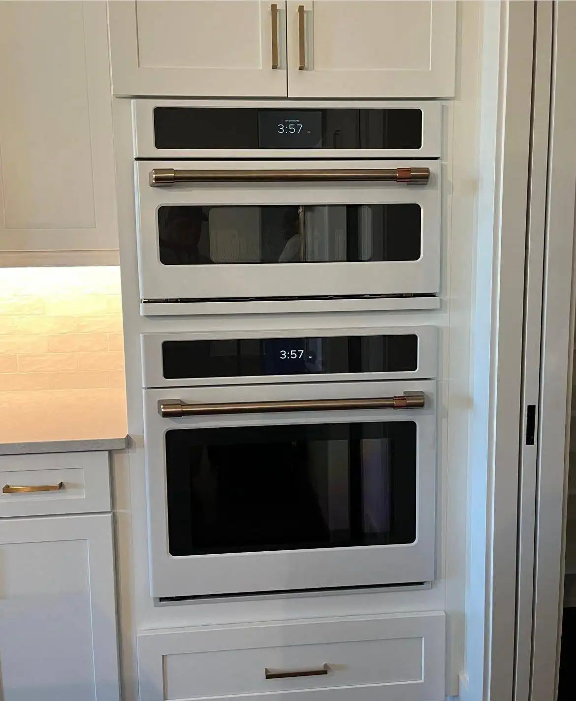 Built-in oven and microwave set in kitchen cabinetry